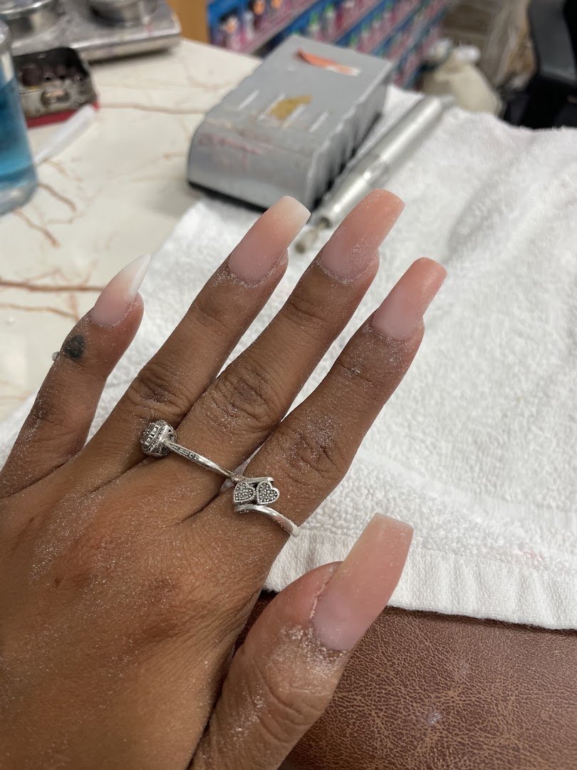 Nail salon interior with manicure stations